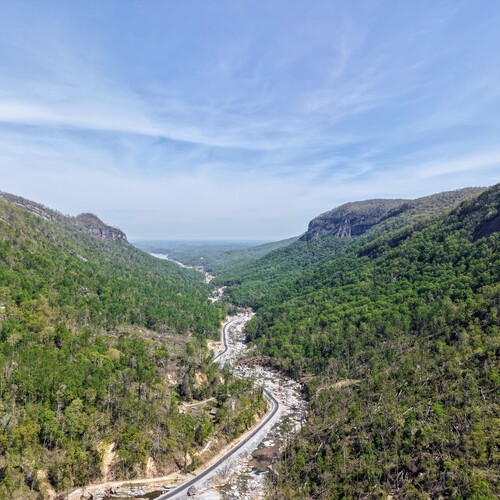 Aerial footage of Rocky Broad River toward Lake Lure and Chimney Rock.