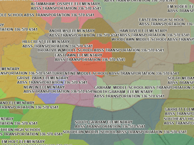 A map of Alamance County displaying color-coded school attendance zones with labels for some of the Alamance-Burlington School System elementary, middle, and high schools.